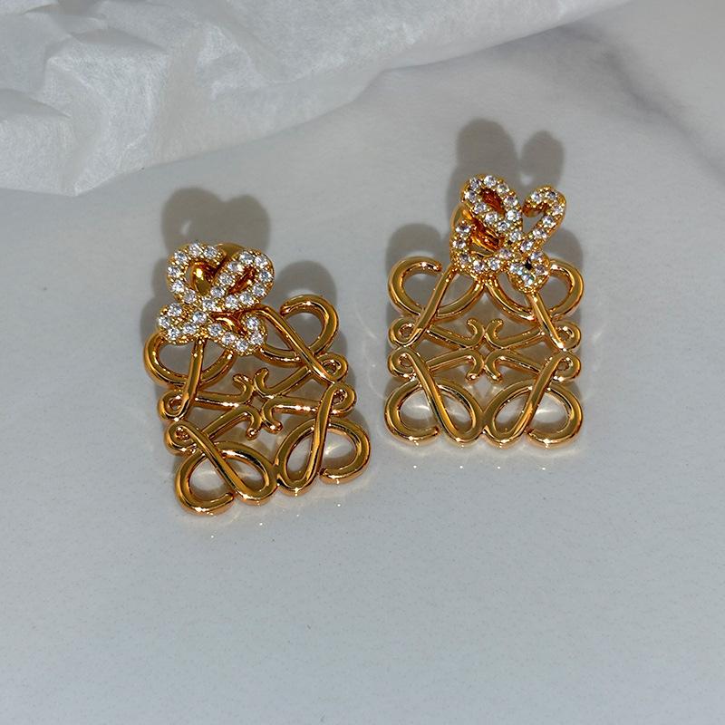 Silver needle a multi-wear super flash zircon earrings women s niche stud earrings real gold electroplated earrings