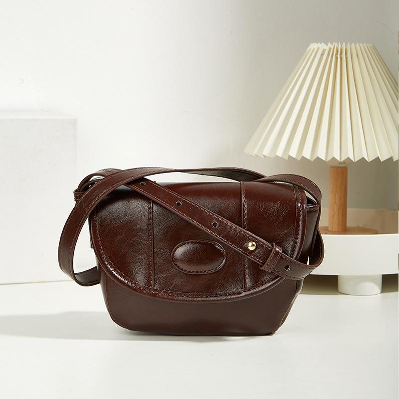 

Retro new women s bag versatile oil wax leather saddle bag simple solid color soft-faced underarm bag shoulder messenger bag