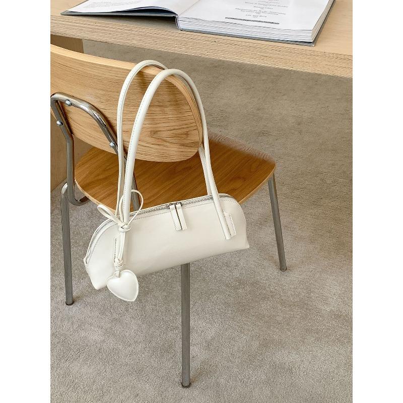 Liebe Baguette-Tasche, einfache Achseltasche, Nischen- und vielseitige neue Hand-Schultertasche für Damen