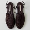 Sheepskin Version~ Niche Retro Woven Roman Shoes One-word Buckle Flat Bottom Fishing Net Bag Head Sandals Women Wear Half Slippers