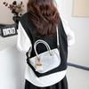 Niche design retro handbag women's new fashion versatile shoulder messenger bag bucket bag