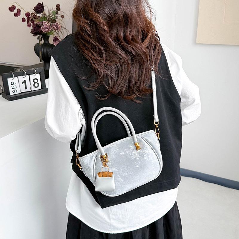 Niche design retro handbag women's new fashion versatile shoulder messenger bag bucket bag