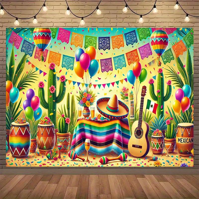 Une pièce de décoration de festival mexicain - avec des éventails en papier, des chapeaux de paille et des maracas pour un fond en tissu intérieur et extérieur