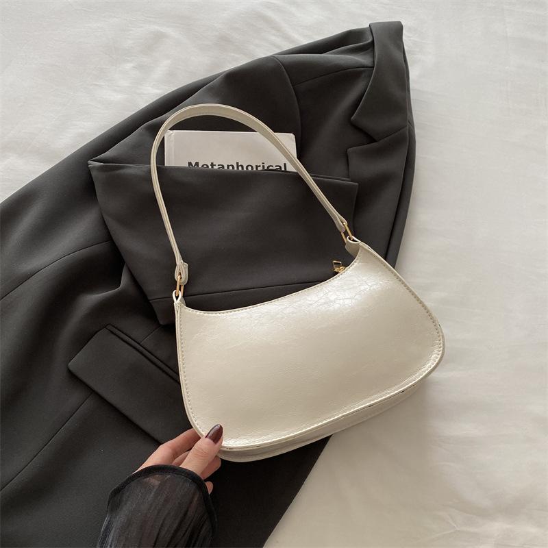 

Сумка с изюминкой женская 2025 осень и зима новая сумка-багет ретро ручная подмышечная сумка в иностранном стиле сумка на плечо для девочки белый