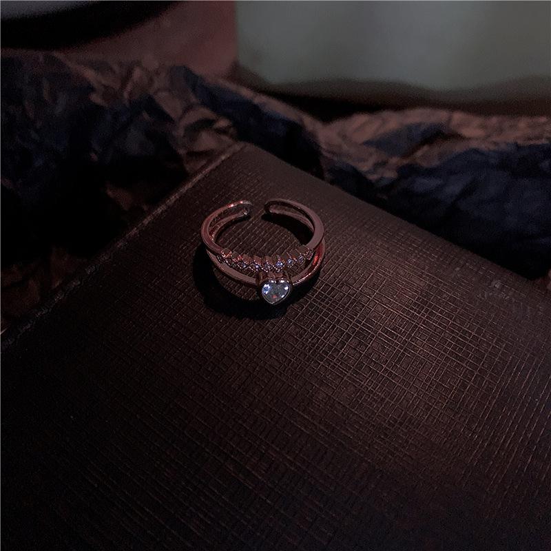 

Sense of design Slightly inlaid with diamonds Love ring Personality temperament ins Cold wind Index finger Zircon tail ring adjustable open design