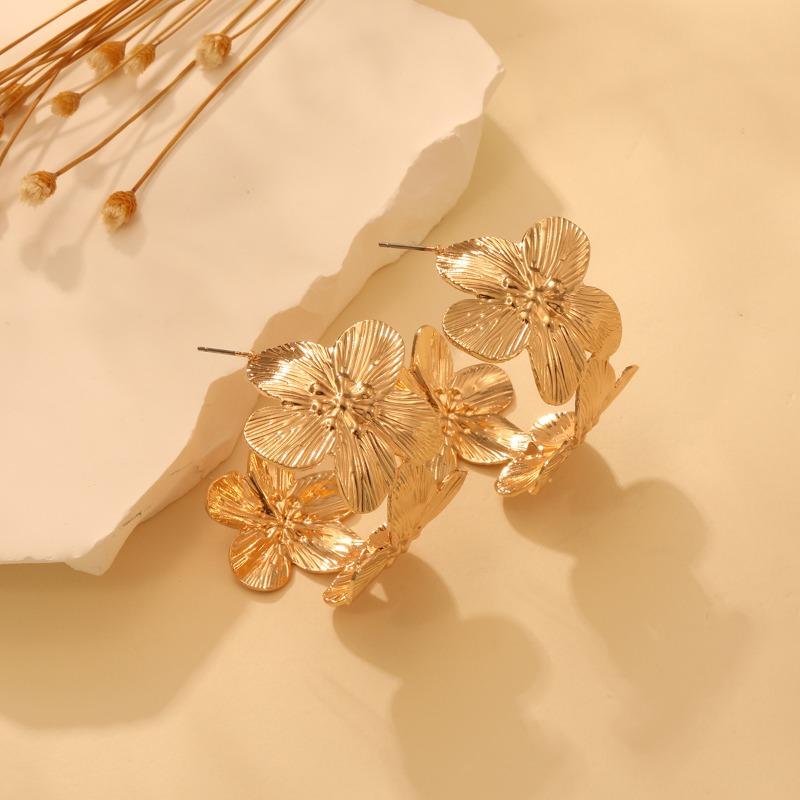 Meier Earrings: minimalist metal leaf statement earrings - high-end c-shaped hoop earrings
