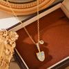 Elegant Golden Shovel Necklace: High-End Light Luxury Fashion, Wealth-Attracting Pendant for Women, Retro Sweater Chain Choker.