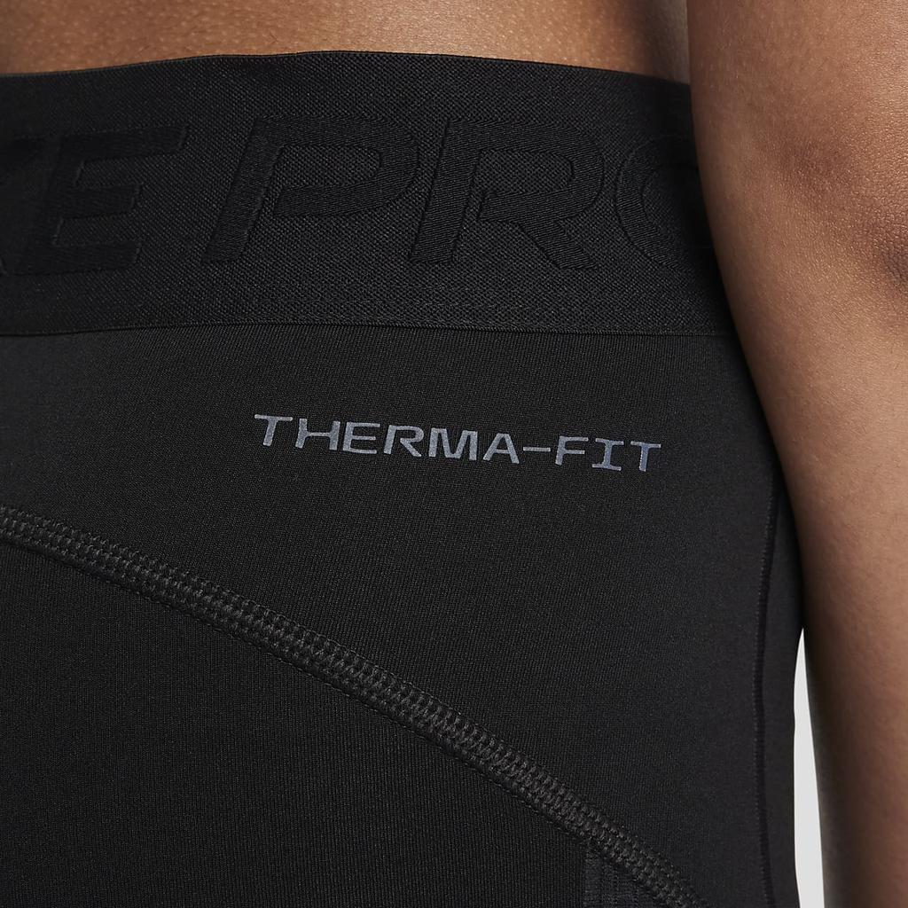 Nike Therma-Fit Pro Pohodlné K pokožce šetrné Legíny se středně vysokým pasem Dětské legíny Černá Bílá HF4674-010