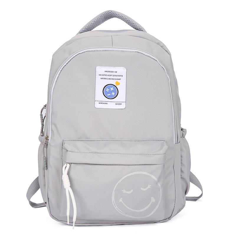 School BagsNew casual backpack, male and female junior high school college student , simple and versatile outdoor travel backpack tide