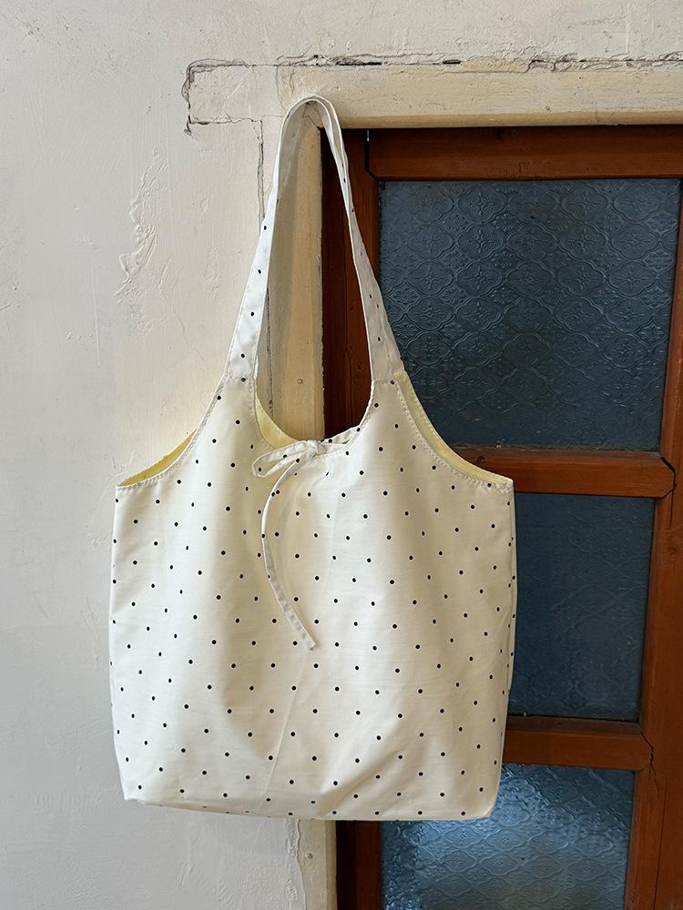 Korean polka dot bow canvas bag women's 2025 new summer shoulder tote bag daily commuter armpit bag