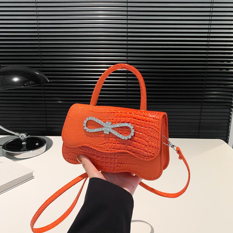 Portable casual simple personalized bow women's bag new fashion shoulder messenger small square bag