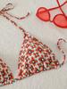 2025 European & American Three-Piece Knitted Bikini Set: Print Halter Neck & Short Skirt Swimwear for Women