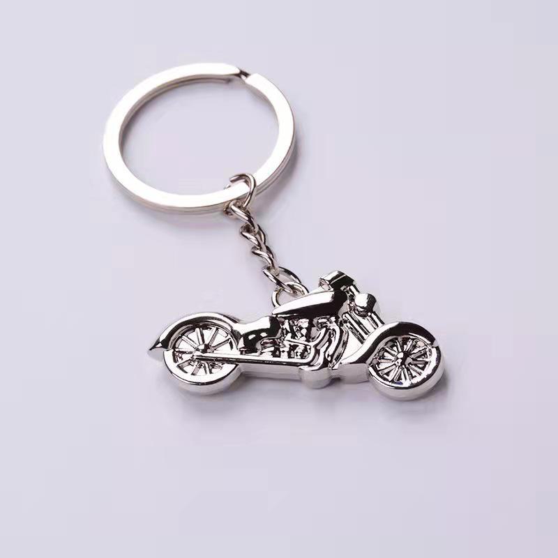 Лазерлік логотипі бар металл мотоцикл салпыншақ - бірегей жарнамалық сыйлық немесе шағын жетон.