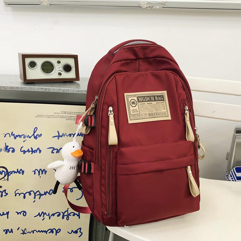 Fashionable Water-Repellent Student Backpack: Trendy High-Capacity Design for Couples