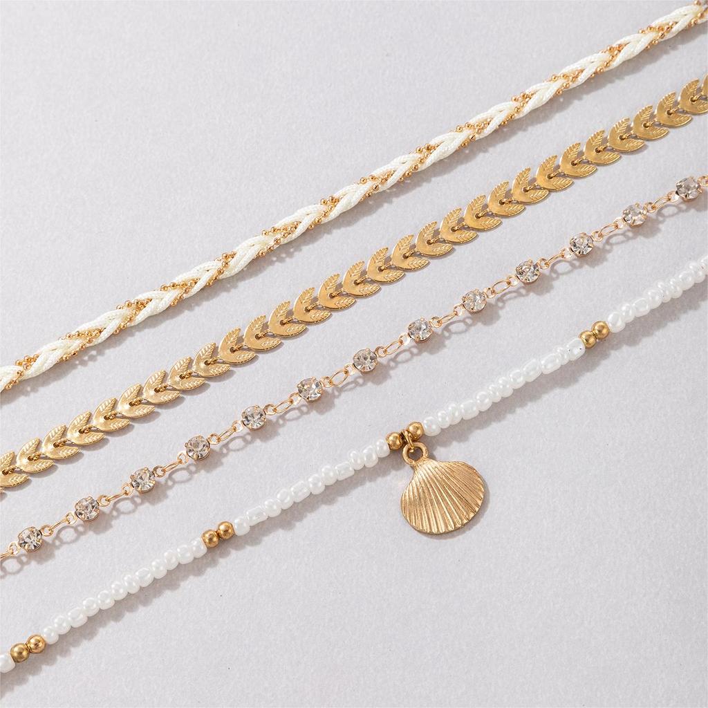 Grenzüberschreitender Schmuck, Reiskörnerperlen, Perlenketten, Geflochtene Seile, Muscheln, Geometrische Diamantbesetzte Blätter, Mehrschichtiges Armband-Set
