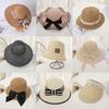 New Women's Summer UV Protection Sweet Ribbon Seaside Vacation Sunshade Bucket Hat Bow Large Brim Straw Hat