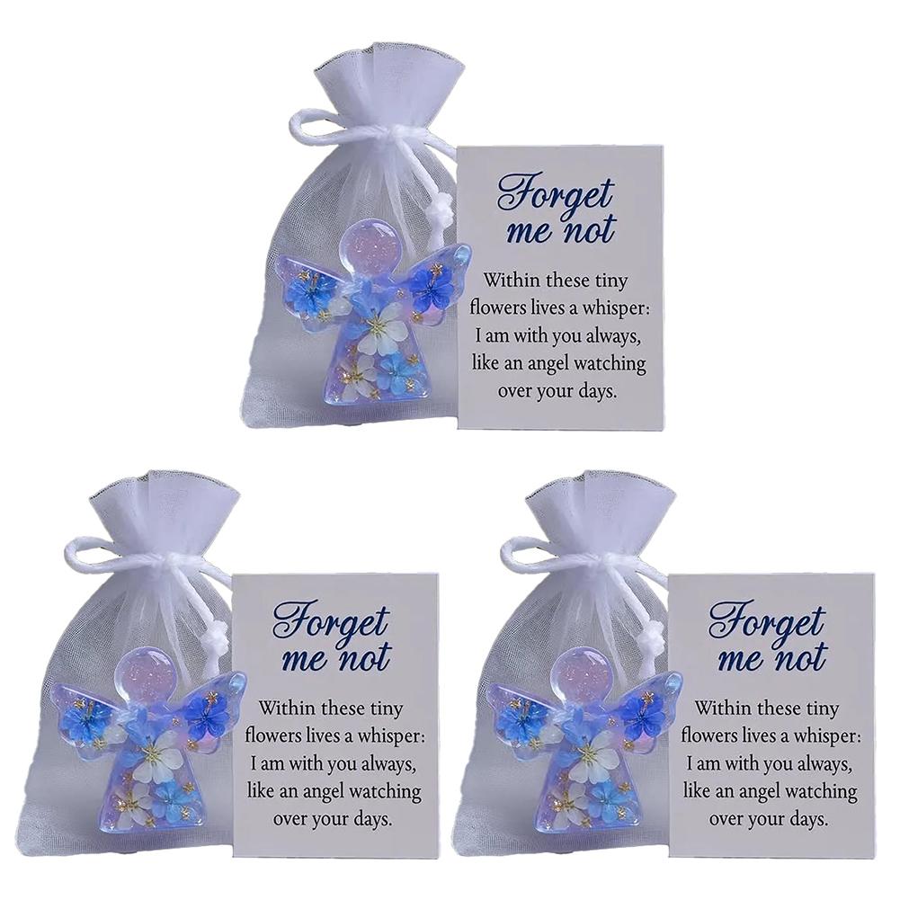 Sympathy Forget Me Not Angel present with intricate flower accents created to offer peace and remembrance in times of sorrow