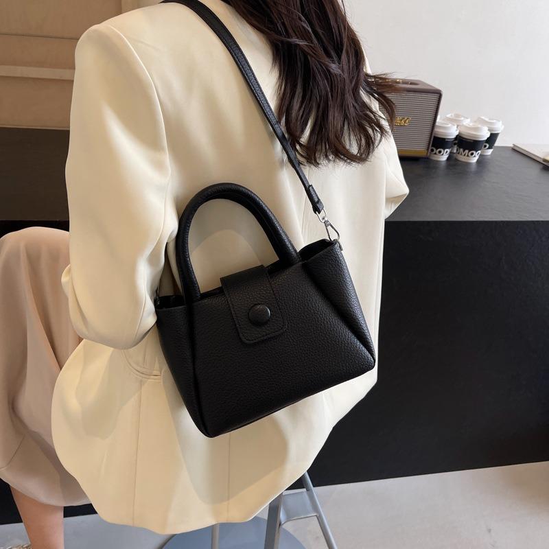 Nisch enkel handväska damväska höst och vinter ny avslappnad enkel hinkväska axelväska