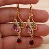 These colorful teardrop and vine earrings, available in multiple colors, are perfect for Thanksgiving and Christmas parties.