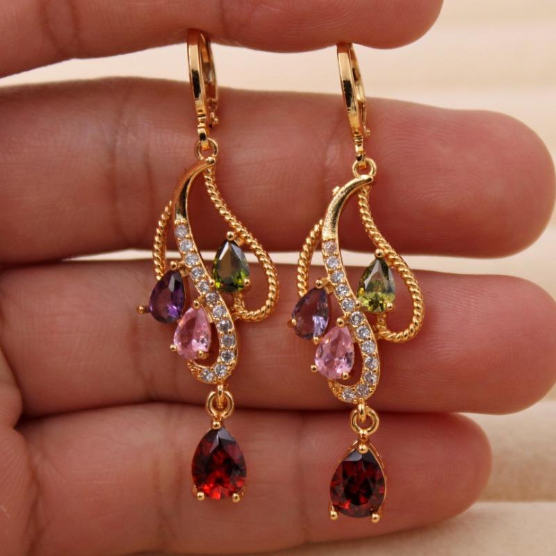 These colorful teardrop and vine earrings, available in multiple colors, are perfect for Thanksgiving and Christmas parties.
