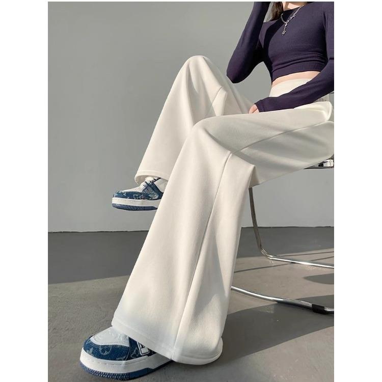 Wygodne i stylowe szare spodnie damskie w amerykańskim stylu ze sznurkiem i szerokimi nogawkami, idealne do noszenia na co dzień i do uprawiania sportu