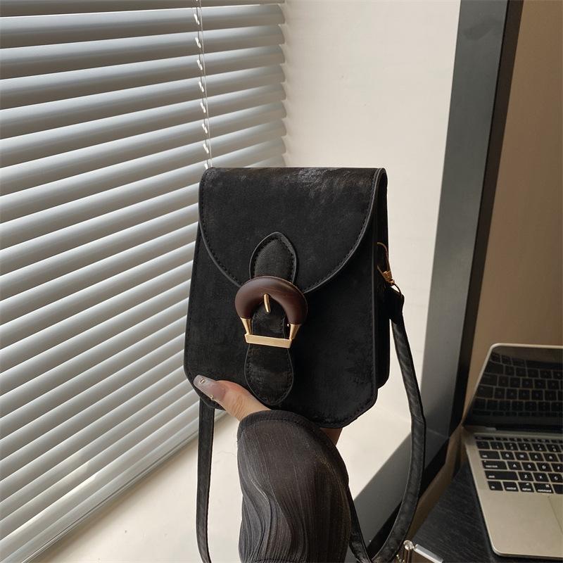 

Solid color high value temperament vertical mobile phone bag storage bag versatile casual shoulder messenger bag women s bag