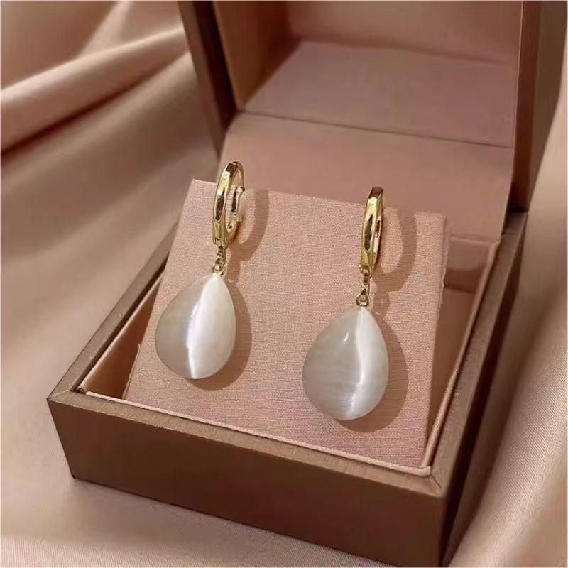 Elegant, Minimalist Drop-shaped Drop Earrings with A Double-sided Cat's Eye Stone in 18K Metal.… More