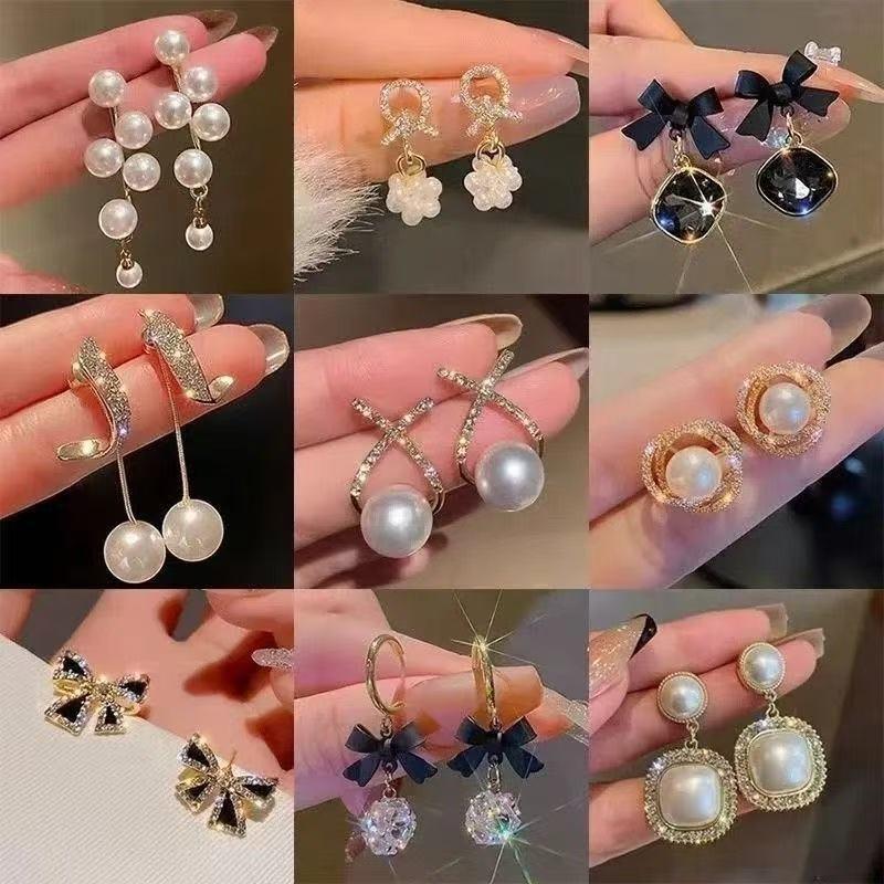 Pendientes de perlas de alta gama de moda Pendientes retro de nicho francés de lujo ligero Pendientes de perlas simples y versátiles para mujer
