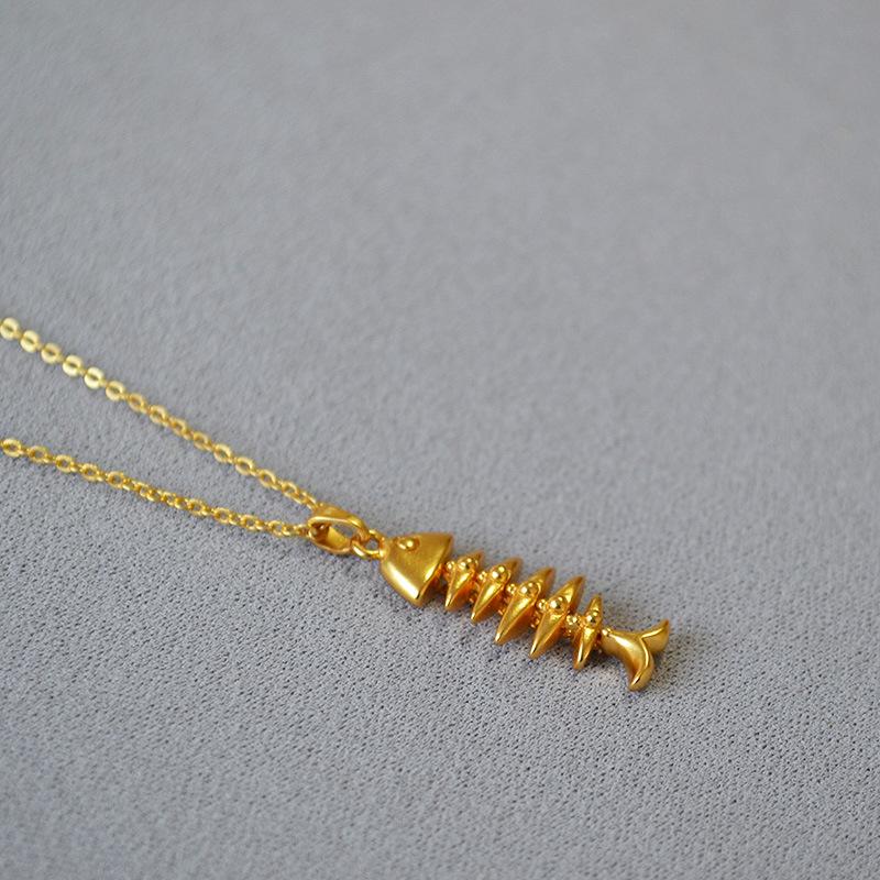 Timeless European & American Retro Gold-Plated Fishbone Pendant Necklace for Women