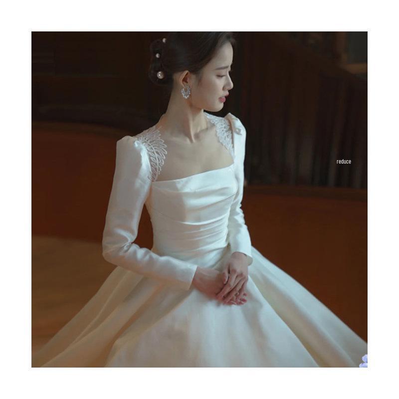 Elegant Backless Satin Wedding Gown - Vintage French-Inspired Long Sleeve Dress