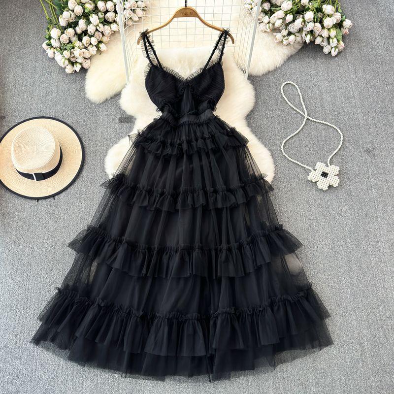 

Модная сетчатая юбка-подвеска с открытой спиной и неровным подолом, напоминающая торт Black All yards