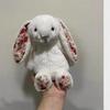 Floral Bunny Doll In White, Deep Pink, Light Pink, Brown, Grey, and Purple by Jellycat