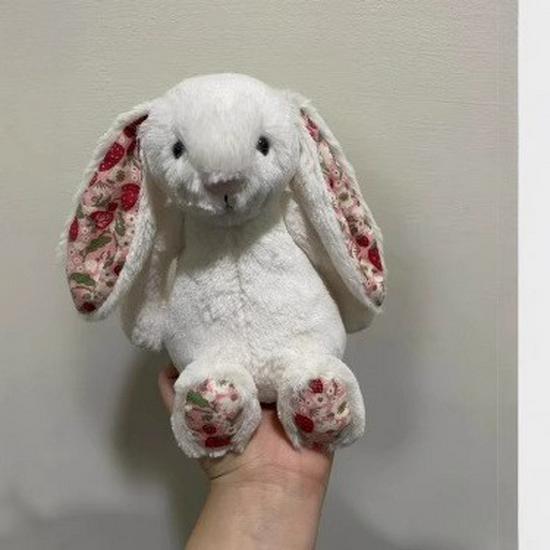 Floral Bunny Doll In White, Deep Pink, Light Pink, Brown, Grey, and Purple by Jellycat