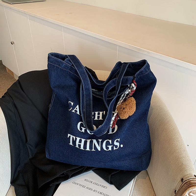 

2025 new personalized Korean version of literary and casual autumn fashion niche design portable large-capacity shoulder bag women without pendant темно-синий