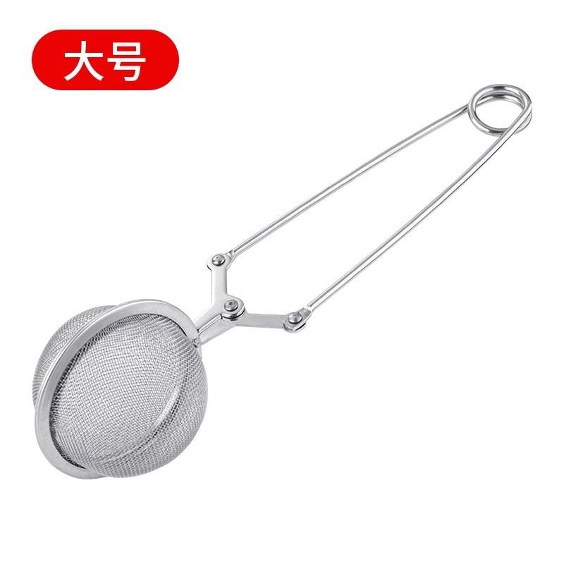 Stainless steel mesh tea ball powder scattering and residue filtering device. Home-use pressing type handle. Tea circular filter. Tea.