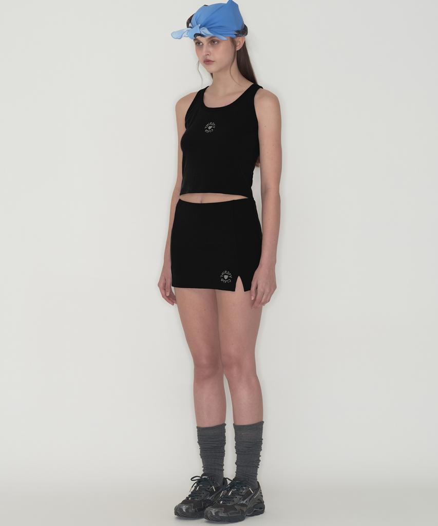 Tteolseutikeulleob Round Logo Slit Skirt Pants - Black