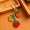 Kreativer Tomaten-Anhänger PU-Leder Oranger Schlüsselanhänger Modischer Obst-Schlüsselanhänger Rucksack-Dekoration