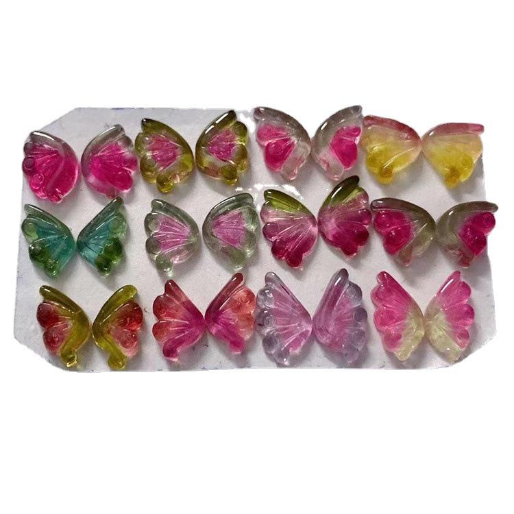 Four Treasures Jewelry offers natural tourmaline butterfly and lotus bead carved bracelets.