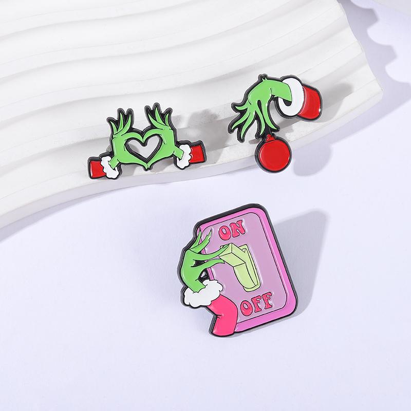 Green Monster Heart Hands Enamel Pin Animated Characters Merry Christmas Brooches Lapel Badge Fashion Jewelry Gifts for Friends