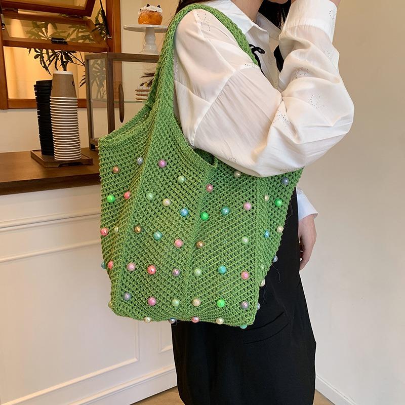 Large capacity tote bag women's seaside vacation weaving lazy literary leisure commuting leisure design shoulder armpit bag