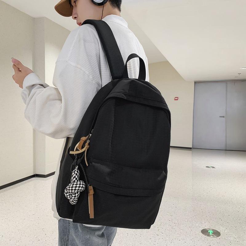 

New leisure travel men s backpack junior high school students small fresh college students large capacity solid color women s backpack schoolbag чорний