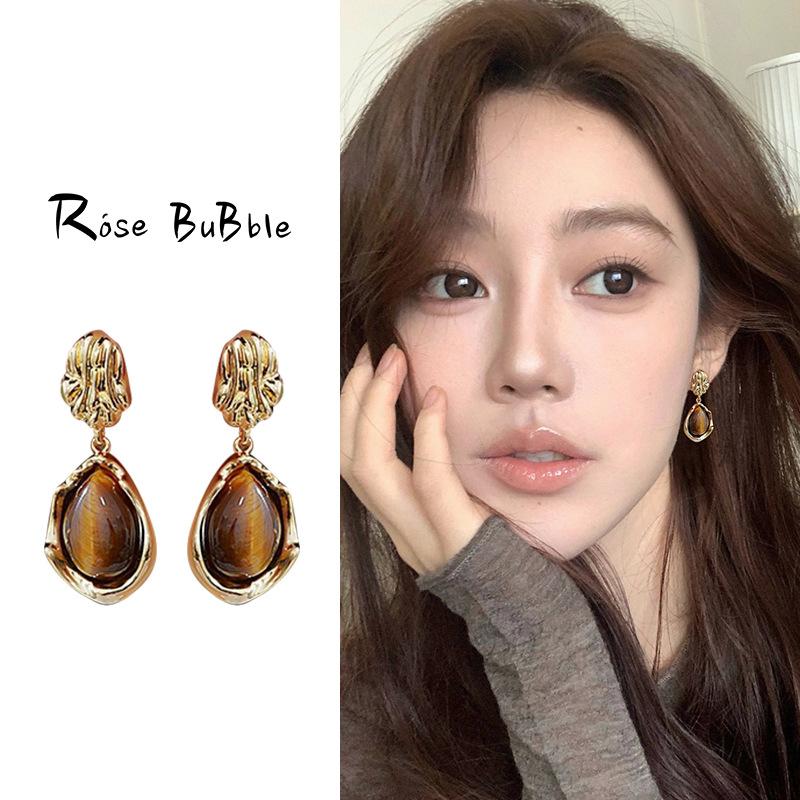 

Tiger s eye stone retro stud earrings, high-end sense, medium and ancient style, niche European and American temperament, Maillard earrings