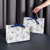 WTEMPO Large Capacity Hand-held Gift Paper Bags Retro Elegant Printed Bags Daily Presents Packaging Bags Ideal for Storing and Gifting Delicate Items
