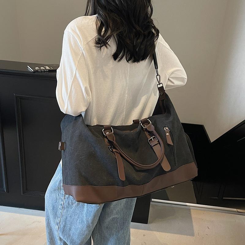 New canvas hand-held travel bag men's outdoor sports duffel bag travel fitness messenger large-capacity storage bag women