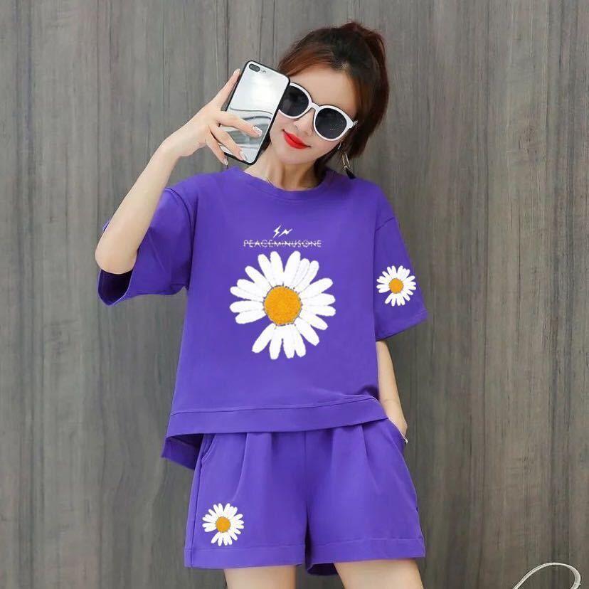 

Повседневный спортивный костюм для женщин Летний комплект из двух предметов с принтом ромашек, с коротким рукавом, свободные шорты, больших размеров, из полиэфирного волокна M фиолетовый