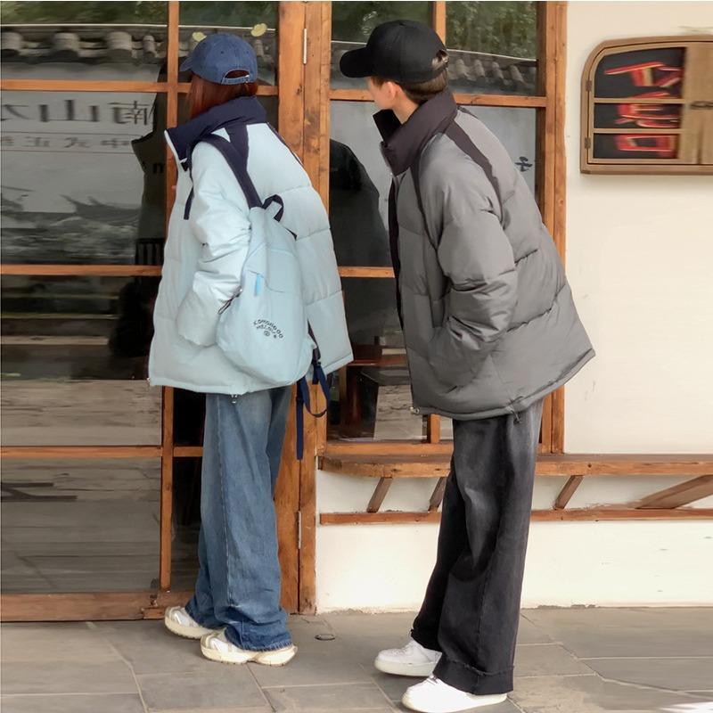 Wear stand-up collar cotton-padded clothes, women's winter thick coats, new men's and women's cotton-padded jackets, and bread clothes are trendy.