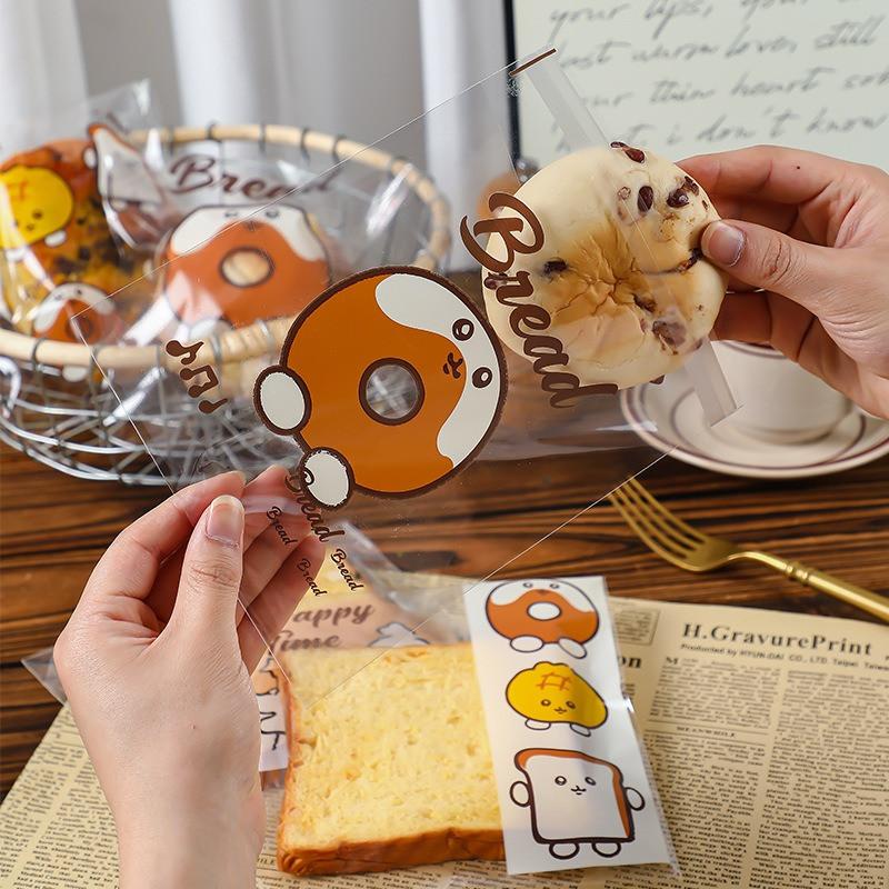 100Pcs 17x17cm Clear Transparent Bread Bags Toast Cake Printed Snack Bread Coffee Shop Food Packaging