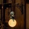 Indoor Outdoor Statue Alien Reading on Moon Hanging Lamp, Resin Bookshelf Light, Gift for Space Lovers Warm LED Night Light Decor Patio Garden Window