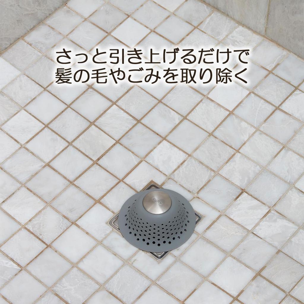 OXO Silicone Drain Strainer Hair Catcher for Bathroom Shower Prevents Clogs and Stays in Place -