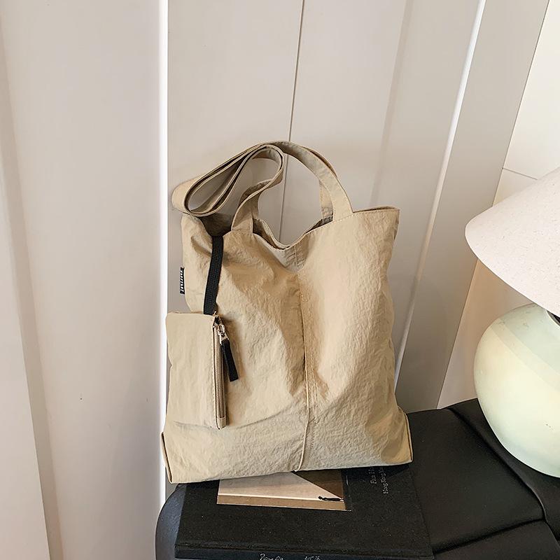 

Summer new drawstring design solid color large-capacity folding shopping bag multi-pocket shoulder bag commuter cloth bag